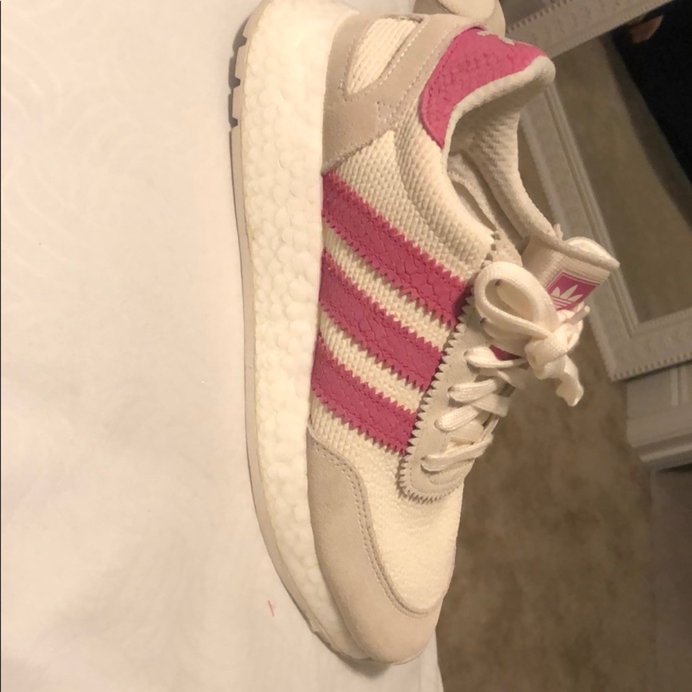 Creamy white and pink adidas shoes